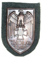 Rukávový štítek Cholm.